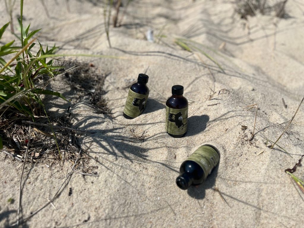 Boston Bay Rum Bottles on the Beach