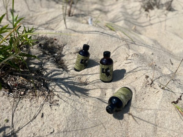 Boston Bay Rum Bottles on the Beach
